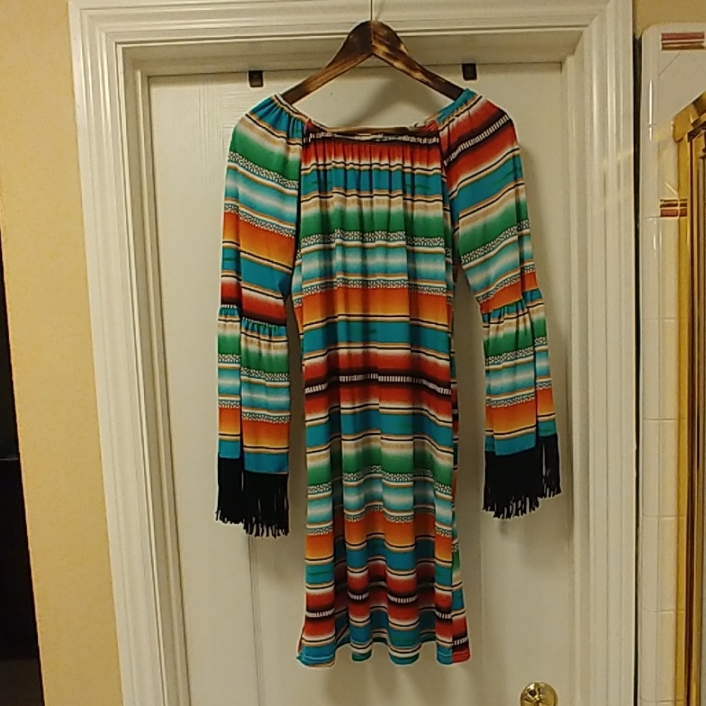 Serape dress will help, fringed sleeves